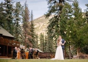 Photo of a First Dance at an Estes Park Wedding with the Mountains in the Background.
