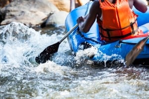 A Person Whitewater Rafting near Estes Park
