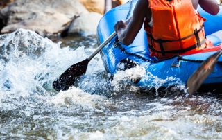 A Person Whitewater Rafting near Estes Park